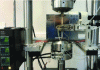 Figure 18 - Image of the experimental set-up combining
a high-temperature furnace and a high-temperature extensometer made
of ceramic rods.