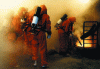 Figure 4 - Practical extinguishing of a multi-liter sodium fire (CEA/Cadarache firefighters)