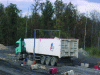 Figure 8 - Ash moistening and transport by 19 m3 trucks