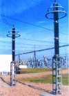 Figure 14 - The surge arrester, comprising three units, is topped by two field distribution rings.