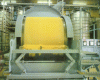 Figure 14 - Continuous vacuum filtration of fractionated MGLA on Florentine filter, Tirtiaux