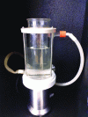 Figure 14 - 550 kHz glass cup-horn reactor with a double jacket to cool the irradiated medium