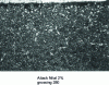 Figure 44 - Nodular (white) carbides on the surface of a martensitic background