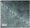 Figure 28 - METHR image of a quasi-periodic grain boundary with angle 90° around [001] and plane (110)1//(100)2 in gold