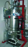 Figure 33 - 1.5 K cryostat to be coupled to an ion implanter at the bottom flange shown in the photo.