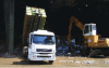 Figure 3 - Self-loading dump truck