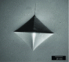 Figure 7 - Optical micrograph of a Vickers impression in 3Y-TZP zirconia dental ceramic [32].