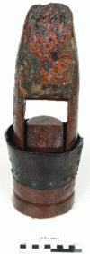 Figure 22 - Pump nozzle combining wood, copper alloy, leather and pyrite (© ARC-Nucléart)