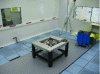 Figure 19 - Photo of the mAFM in the clean room, resting on a vibration-damping table and a concrete base.
