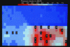 Figure 4 - Example of a sound level prediction map: from the noisiest (red) to the quietest (dark blue). Results depend on building geometry and materials, sound power and machine position (black squares). Note the partition effect between a machine zone and an assembly zone (CETIM document).