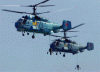 Figure 2 - Two Russian Ka-27PL helicopters with their VGS3 hardened sonar out of the water