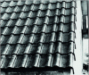 Figure 18 - Interlocking tile roofing with the use of half tiles and special edge tiles (© J.P.)