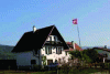 Figure 31 - Banding effect, in the sky, and ringing effect, on the edge of the house roof and mast.