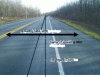 Figure 10 - Segregation in the center of the spreading table leading to asphalt cracking