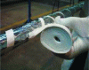 Figure 27 - Piping being insulated by manual winding
