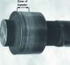 Figure 3 - Adhesive transfer (steel camshaft bearing rubbing against aluminum alloy housing)