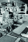 Figure 22 - Suspended polyarticulated robot cutting profiles by flame cutting [Doc. SGN].