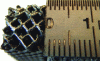 Figure 2 - Supports on the underside of a metal part produced by additive manufacturing (Ti6Al4V SLM sample)