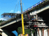 Figure 12 - Demolition and replacement of a pier trestle on the Fozières bridge on the A75 freeway, after temporary shoring of the deck.