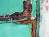 Figure 18 - Corroded and pierced gate