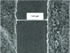 Figure 11 - SEM image of source and drain ohmic contacts spaced 1.4µm apart after metallization and annealing