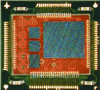 Figure 25 - Example of a SiP module in a BGA package before encapsulation with passive components and mounting of 4 flip chips on an interposer with integrated inductors (source STMicroelectronics).