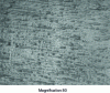 Figure 24 - Ribbon face in contact with the drum: imprints of gas bubbles trapped at the interface