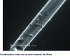 Figure 25 - Observation at 10 kV in an environmental chamber microscope of two glass wool fibers bonded under a partial pressure of 700 Pa (5 torr) (EDF doc.)