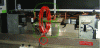 Figure 11 - Principle of
magnetic flow technique in a part placed in the rigid coil of a magnetic
bench (photo credit: SREM Technologies).