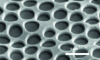 Figure 4 - SEM image of the surface of a YSZ electrolyte membrane modified by the addition of a 1 nm thin film by ALD [27].