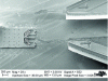 Figure 2 - Image of the tools of a robotic microgripper manipulating a silicon optical component. Both the tools and the optical component are made of silicon using cleanroom microfabrication processes (© Institut FEMTO-ST).