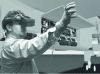 Figure 5 - Maintenance by an operator equipped with a video-headset and digital glove (Crédit Sim Team)